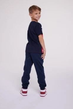 Champion American Tape Cuff Pants - Tracksuit Bottoms - Navy -Kids Clothing Shop 5213e8f2f2464a36babfd13dc15cc5b3