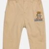 MOSCHINO Baby Trousers - Chinos - Stone 1 MOSCHINO Baby Trousers - Chinos - Stone -Kids Clothing Shop 95939679230941eea3a9debe6dea3801