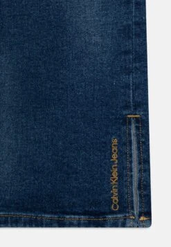 Calvin Klein Jeans Wide Leg - Relaxed Fit Jeans - Mid Blue -Kids Clothing Shop f30aa8e488ac4ecead37739d6a461055